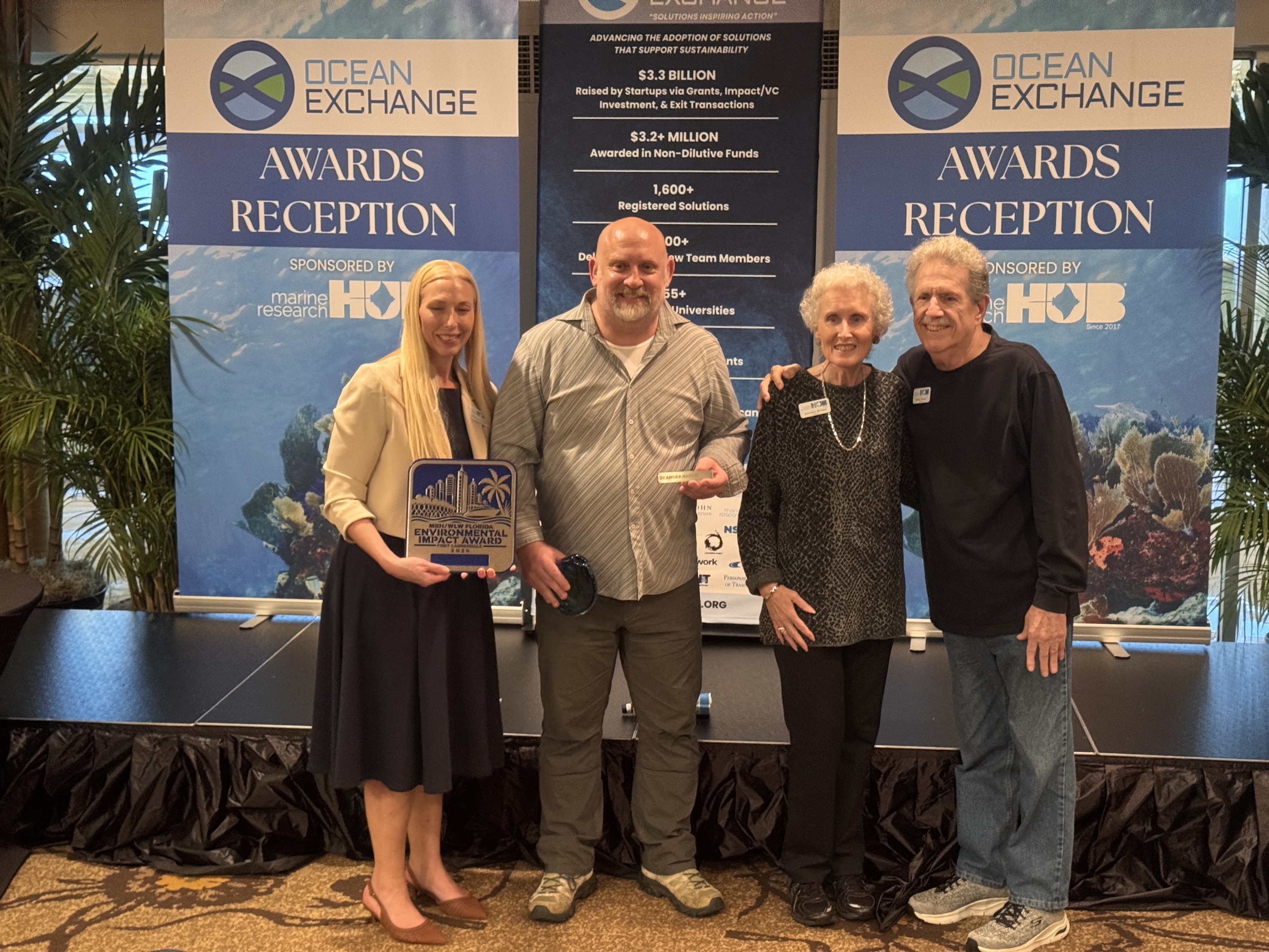 Subtidal and Beam Sea receiving the Wayne and Lucretia Winer Award at Ocean Exchange 2026