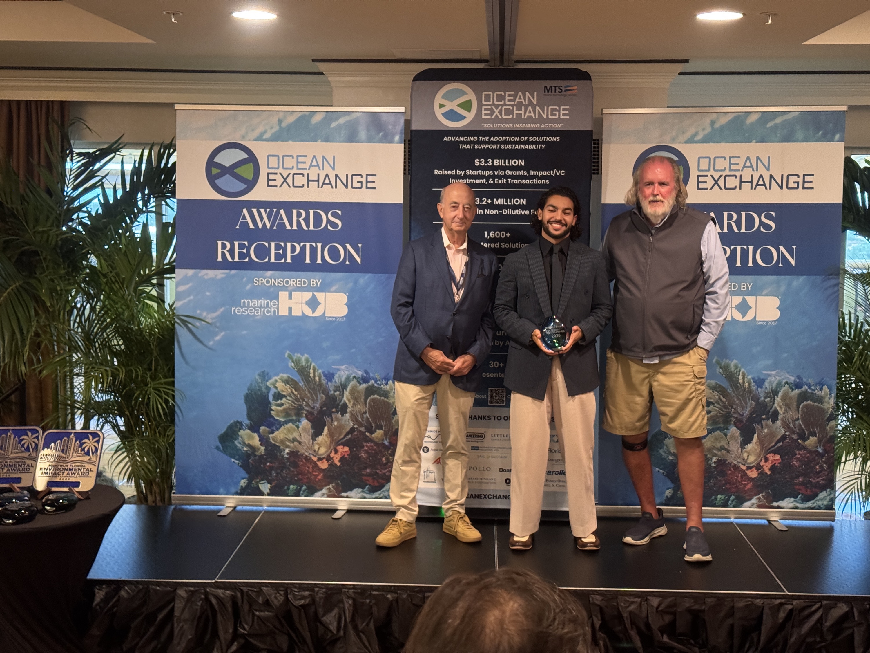 Lauren Brown and AIMM receiving their award at Ocean Exchange 2026